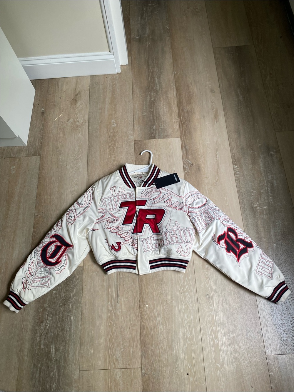 True Religion White Cropped Varsity Jacket with Red TR Applique